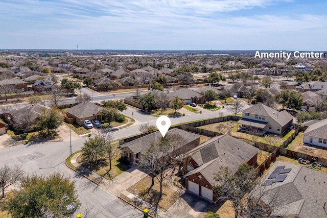 birds eye view of property with a residential view