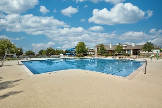 pool with a patio area