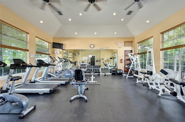 gym with visible vents, vaulted ceiling, a ceiling fan, and recessed lighting