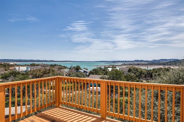 deck featuring a water view