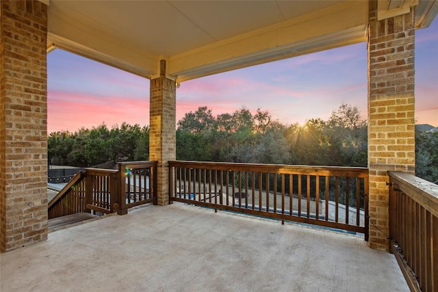 view of patio terrace at dusk