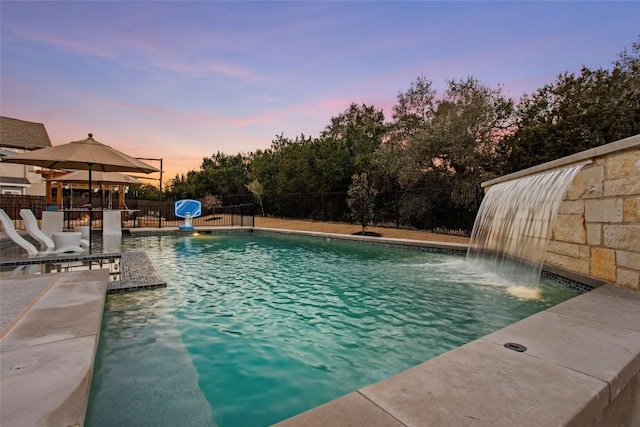 view of pool featuring a patio, fence, and a fenced in pool