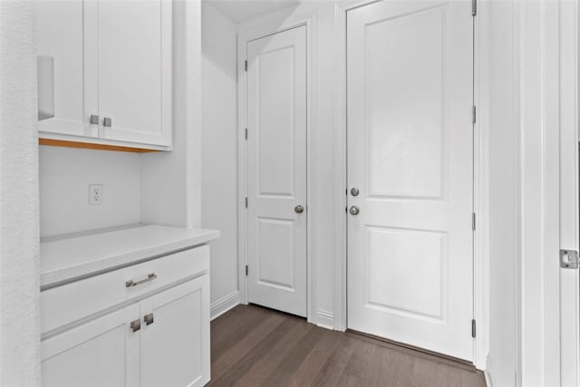 interior space with dark wood-type flooring