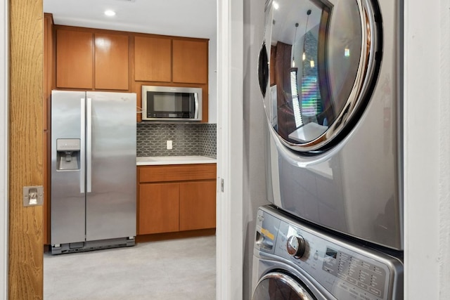 4810 Enchanted Ln, Austin, TX 78745 - laundry room with stacked washer / dryer