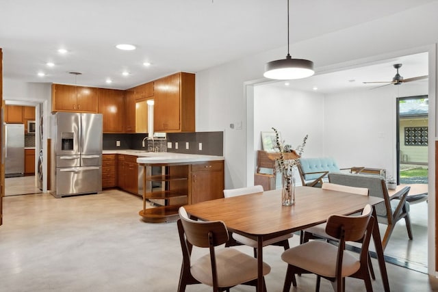 4810 Enchanted Ln, Austin, TX 78745 - dining space featuring recessed lighting, a ceiling fan, and finished concrete flooring