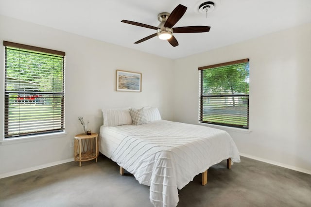 4810 Enchanted Ln, Austin, TX 78745 - carpeted bedroom with baseboards and ceiling fan