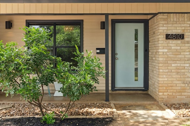 4810 Enchanted Ln, Austin, TX 78745 - doorway to property with brick siding