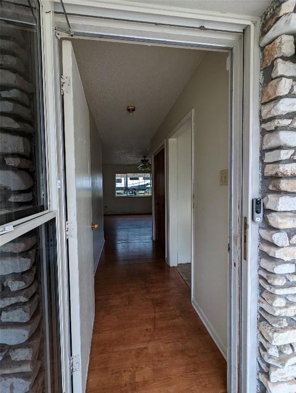 hall featuring wood finished floors