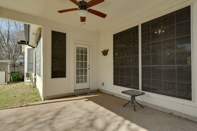 view of patio / terrace featuring a ceiling fan and fence