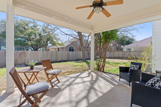 view of patio / terrace featuring a fenced backyard and ceiling fan