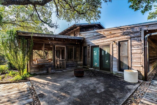 rear view of house with a patio area