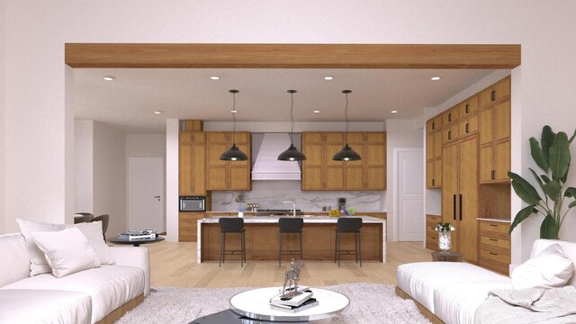 living area with light wood-style floors and recessed lighting