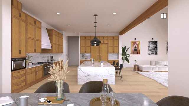 dining room with light wood-style floors and recessed lighting