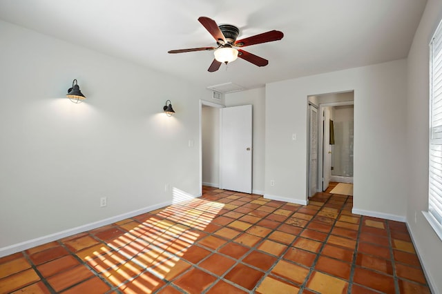 300 Grand Prairie Cir, Dripping Springs, TX 78620 - tiled empty room featuring a ceiling fan and attic access