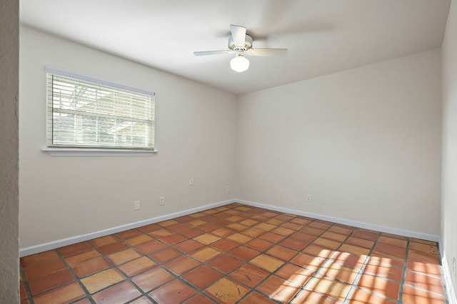 300 Grand Prairie Cir, Dripping Springs, TX 78620 - tiled empty room with ceiling fan and baseboards