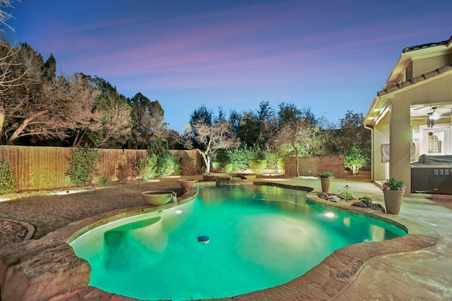 view of swimming pool with a patio and a fenced backyard