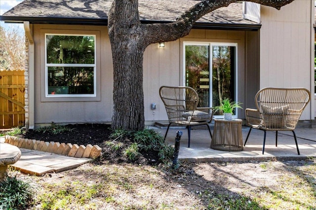 view of patio featuring fence