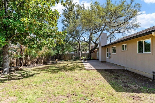 view of yard with a patio area and fence