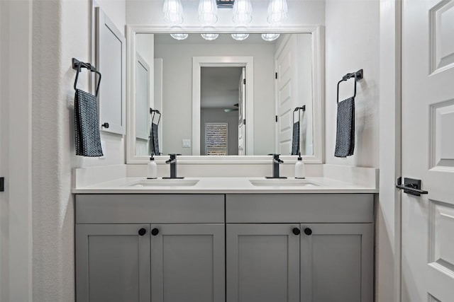 bathroom featuring double vanity and a sink