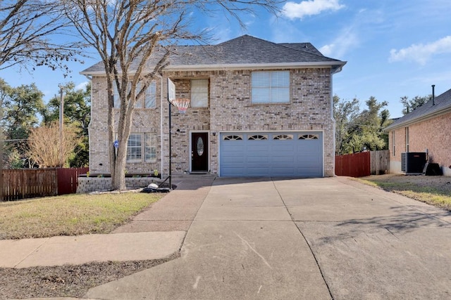 traditional home featuring driveway, central air condition unit, fence, and brick siding