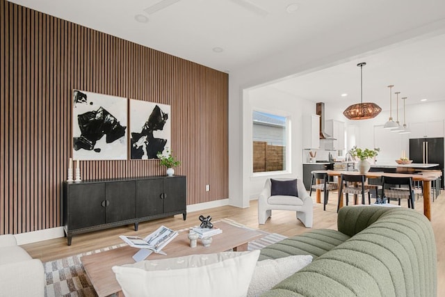 1912 Madison Ave, Austin, TX 78757 - living area with light wood-style floors, baseboards, and recessed lighting