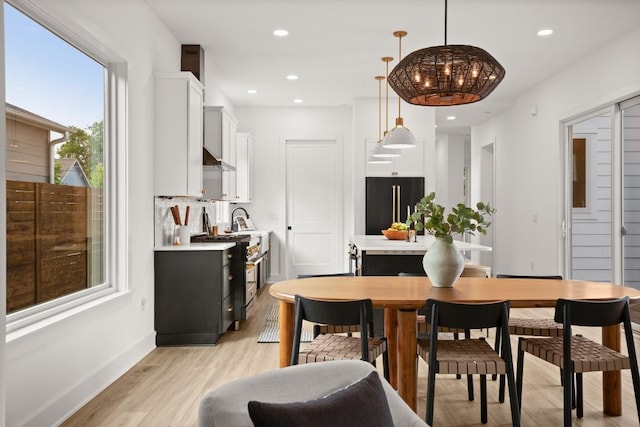 1912 Madison Ave, Austin, TX 78757 - dining space featuring light wood-style flooring, recessed lighting, and baseboards