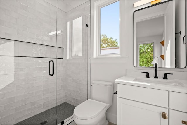 1912 Madison Ave, Austin, TX 78757 - bathroom featuring vanity, toilet, and a shower stall
