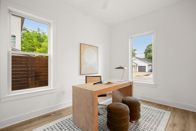 1912 Madison Ave, Austin, TX 78757 - home office with plenty of natural light, light wood-style flooring, and baseboards