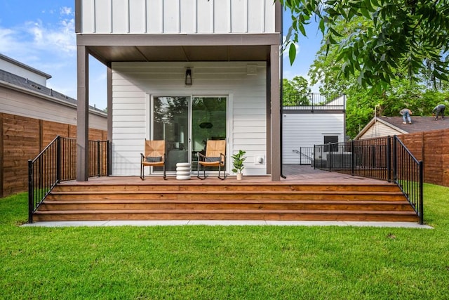 1912 Madison Ave, Austin, TX 78757 - rear view of house with a wooden deck and board and batten siding