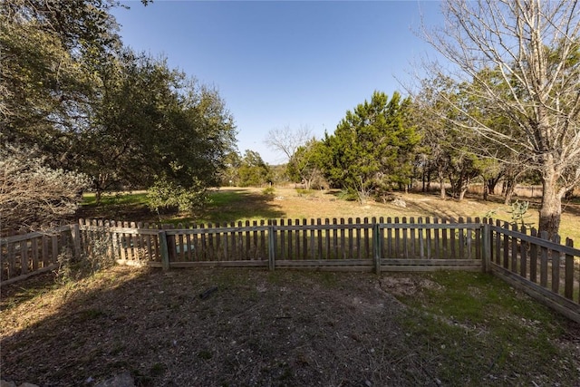 view of gate with fence