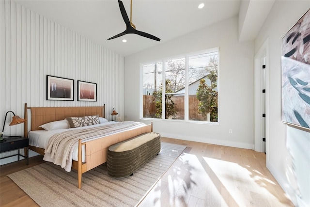 bedroom featuring recessed lighting, ceiling fan, baseboards, and wood finished floors