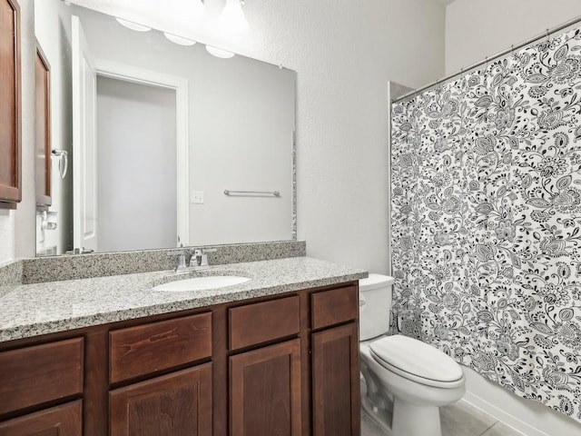 141 Bear Paw Run, Georgetown, TX 78628 - bathroom with toilet, vanity, and tile patterned flooring