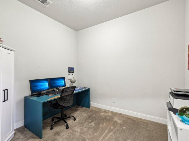 141 Bear Paw Run, Georgetown, TX 78628 - carpeted home office with baseboards