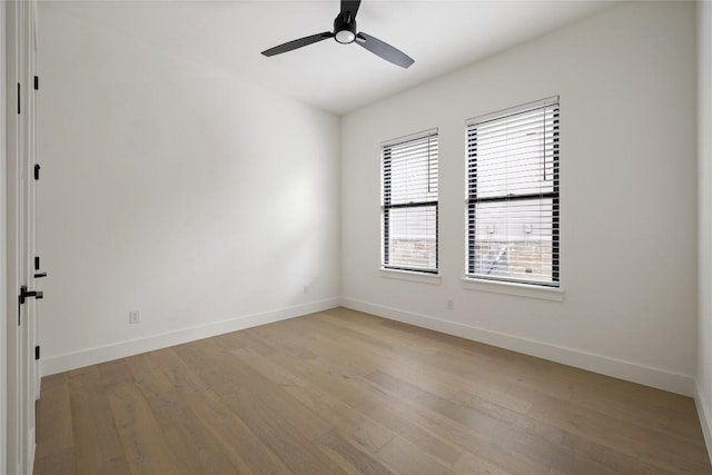 116 Azalea Loop, Horseshoe Bay, TX 78657 - empty room featuring light wood finished floors, baseboards, and ceiling fan
