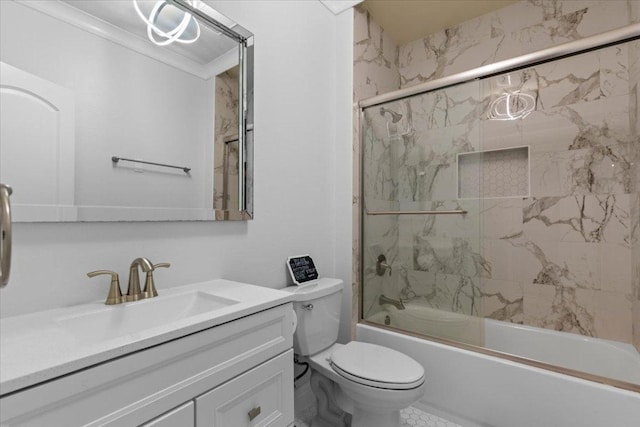 full bathroom with toilet, bath / shower combo with glass door, and vanity