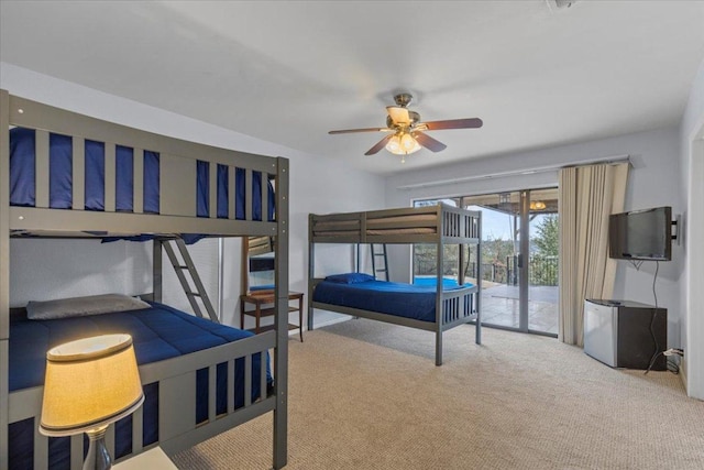 bedroom featuring access to outside and carpet flooring