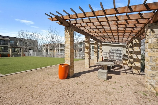 surrounding community featuring fence, a pergola, and a yard