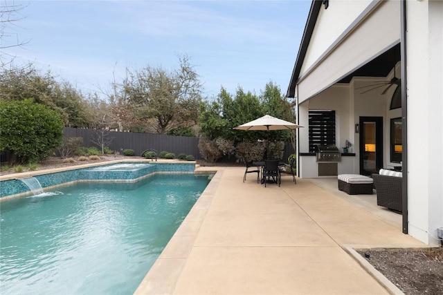 view of pool featuring a fenced backyard, area for grilling, grilling area, a fenced in pool, and a patio area