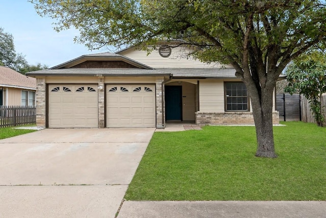 view of front of house featuring fence, driveway, a front lawn, a garage, and brick siding