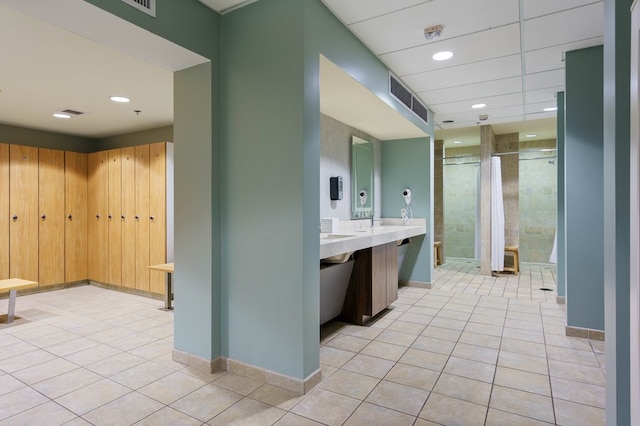 3404 American Dr Unit 3211, Lago Vista, TX 78645 - full bathroom with tile patterned flooring, a shower stall, vanity, and recessed lighting