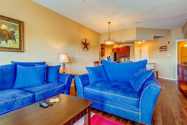 3404 American Dr Unit 3211, Lago Vista, TX 78645 - living room with dark wood finished floors and a textured ceiling