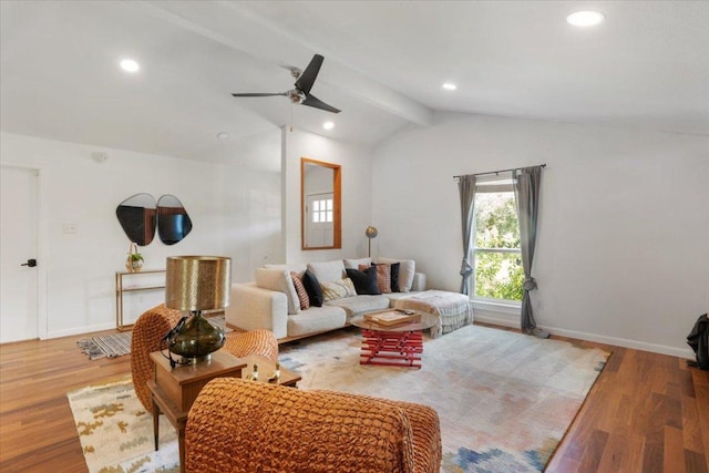 living area with ceiling fan, recessed lighting, wood finished floors, baseboards, and vaulted ceiling