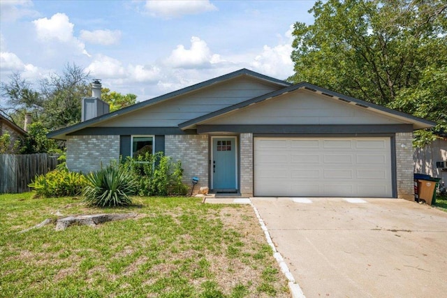 ranch-style home with a garage, driveway, brick siding, fence, and a front yard