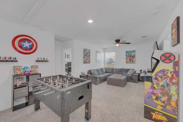 recreation room with attic access, visible vents, ceiling fan, carpet, and recessed lighting