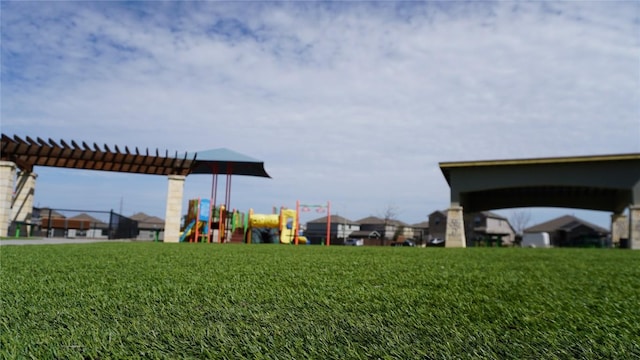 community play area with a yard