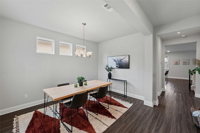 dining room featuring dark wood-style floors, recessed lighting, visible vents, an inviting chandelier, and baseboards