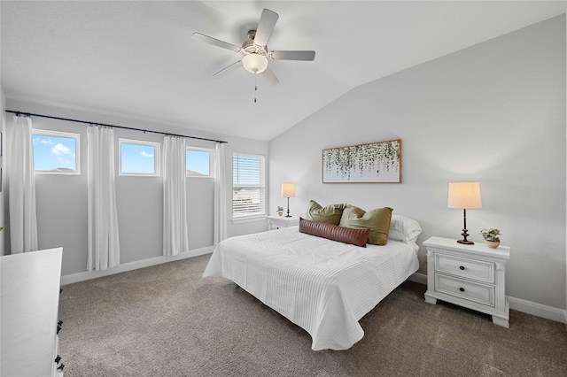 carpeted bedroom with lofted ceiling, a ceiling fan, and baseboards