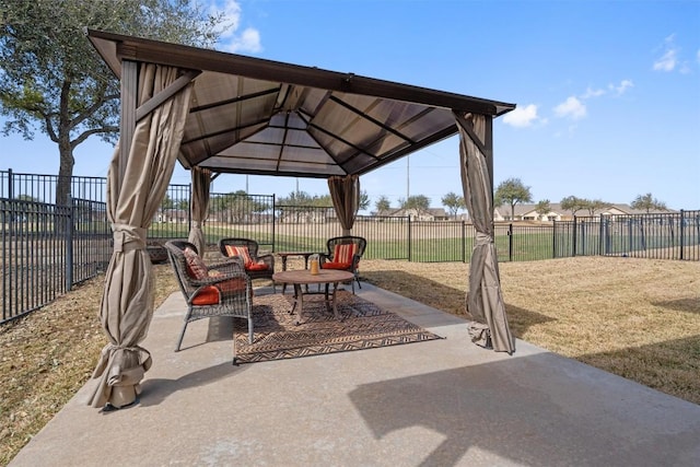 view of patio / terrace featuring fence and a gazebo