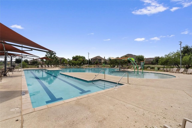 community pool featuring a patio