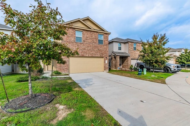 traditional home featuring driveway, an attached garage, a front lawn, and brick siding